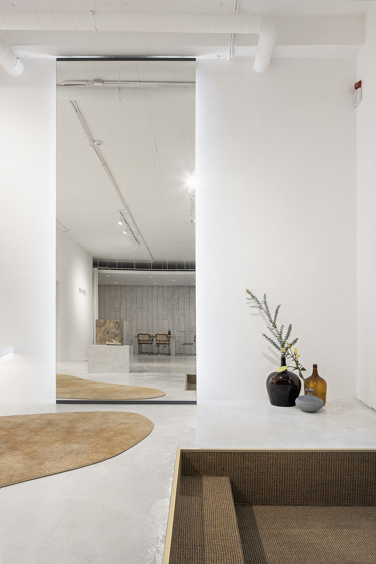 Atelier Holcnerova creates a gallery-like concept store for shoe brand in Lisbon
