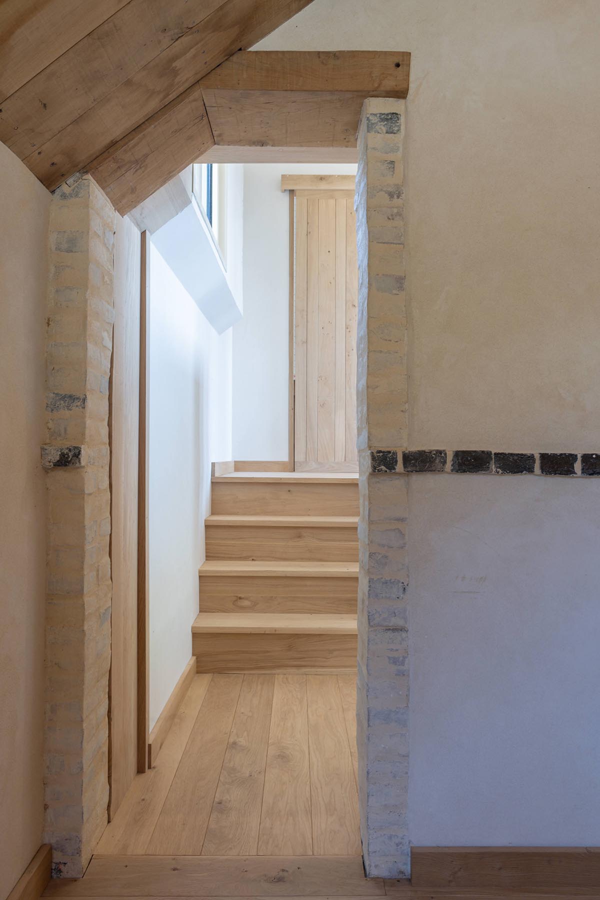 Rural house is renovated with 100 per cent local materials by Anatomies d’Architecture in Normandy