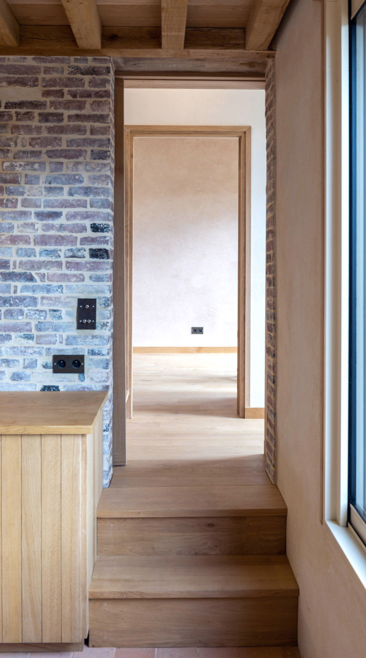 Rural house is renovated with 100 per cent local materials by Anatomies d’Architecture in Normandy