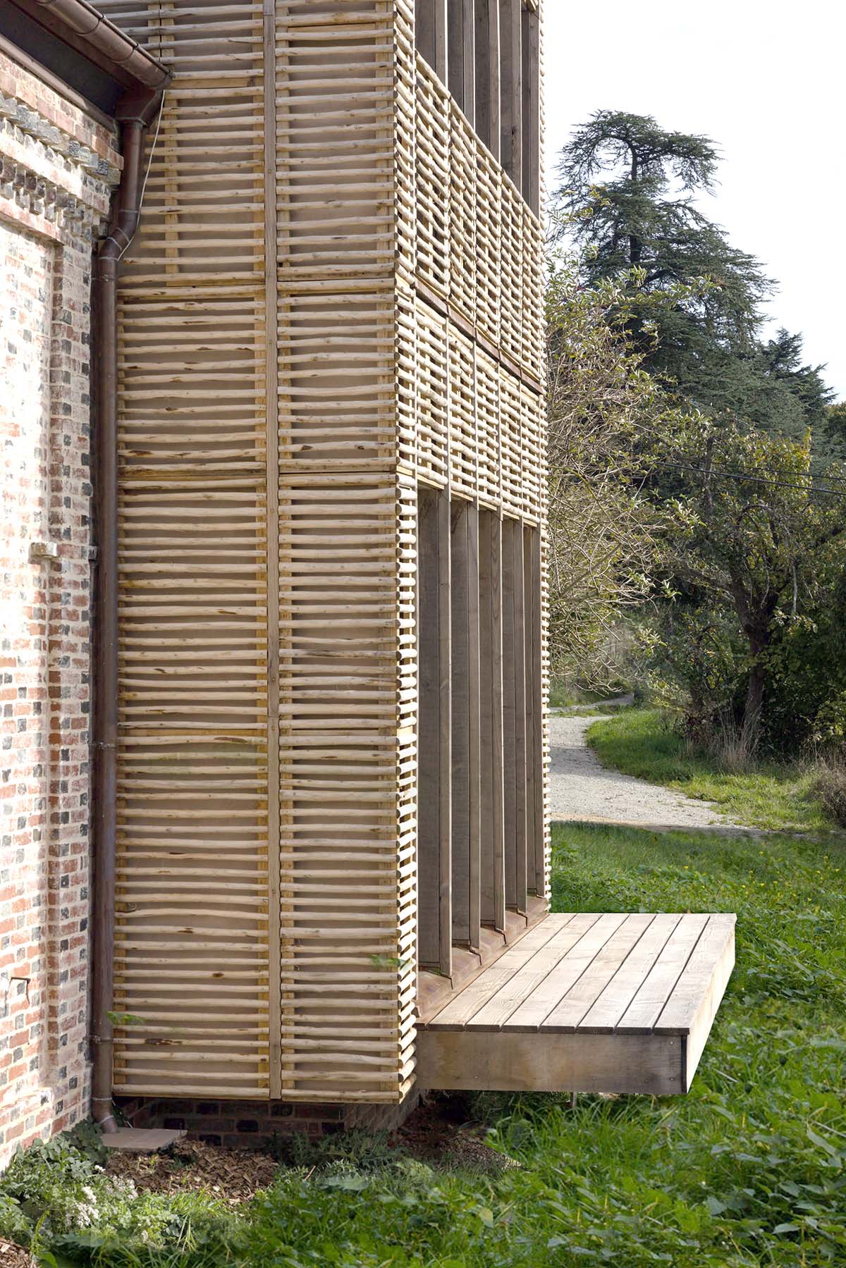 Rural house is renovated with 100 per cent local materials by Anatomies d’Architecture in Normandy