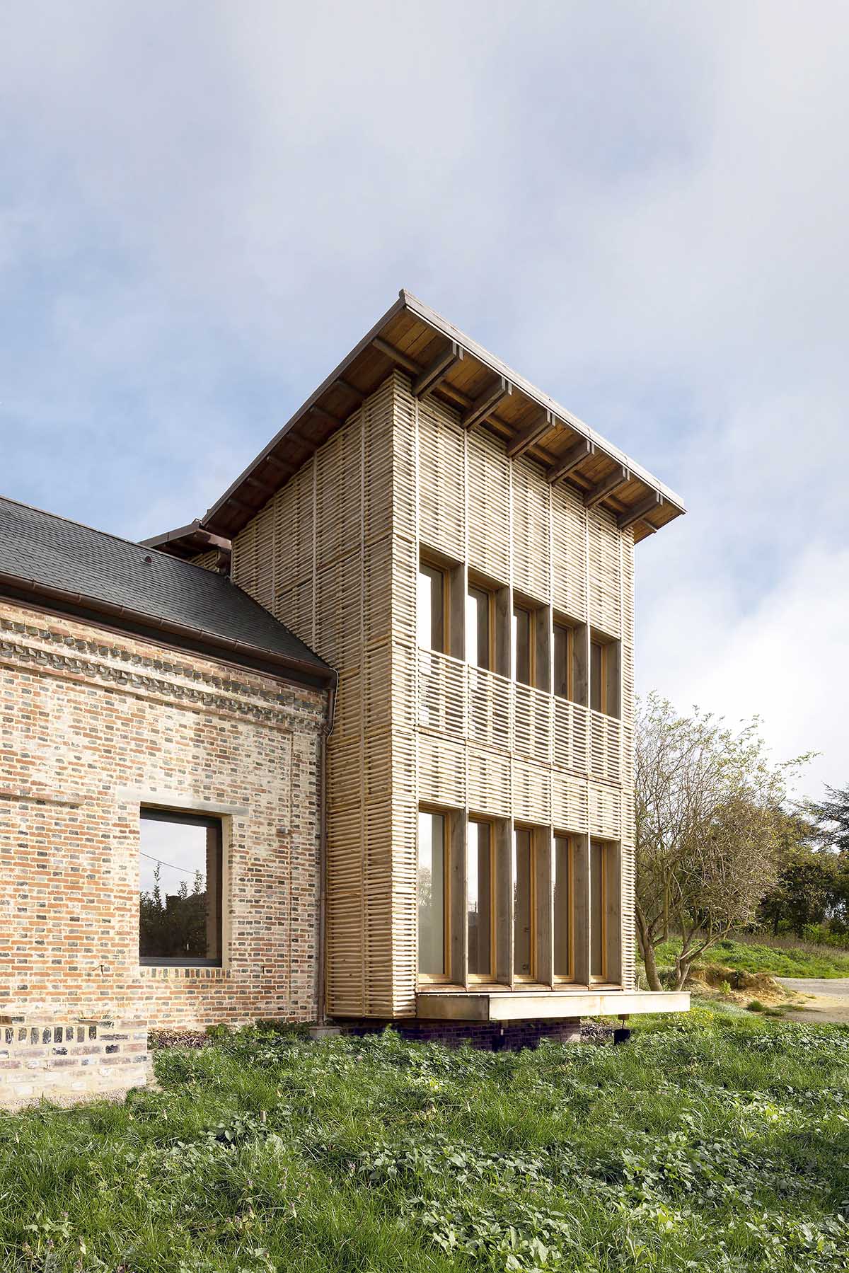 Rural house is renovated with 100 per cent local materials by Anatomies d’Architecture in Normandy