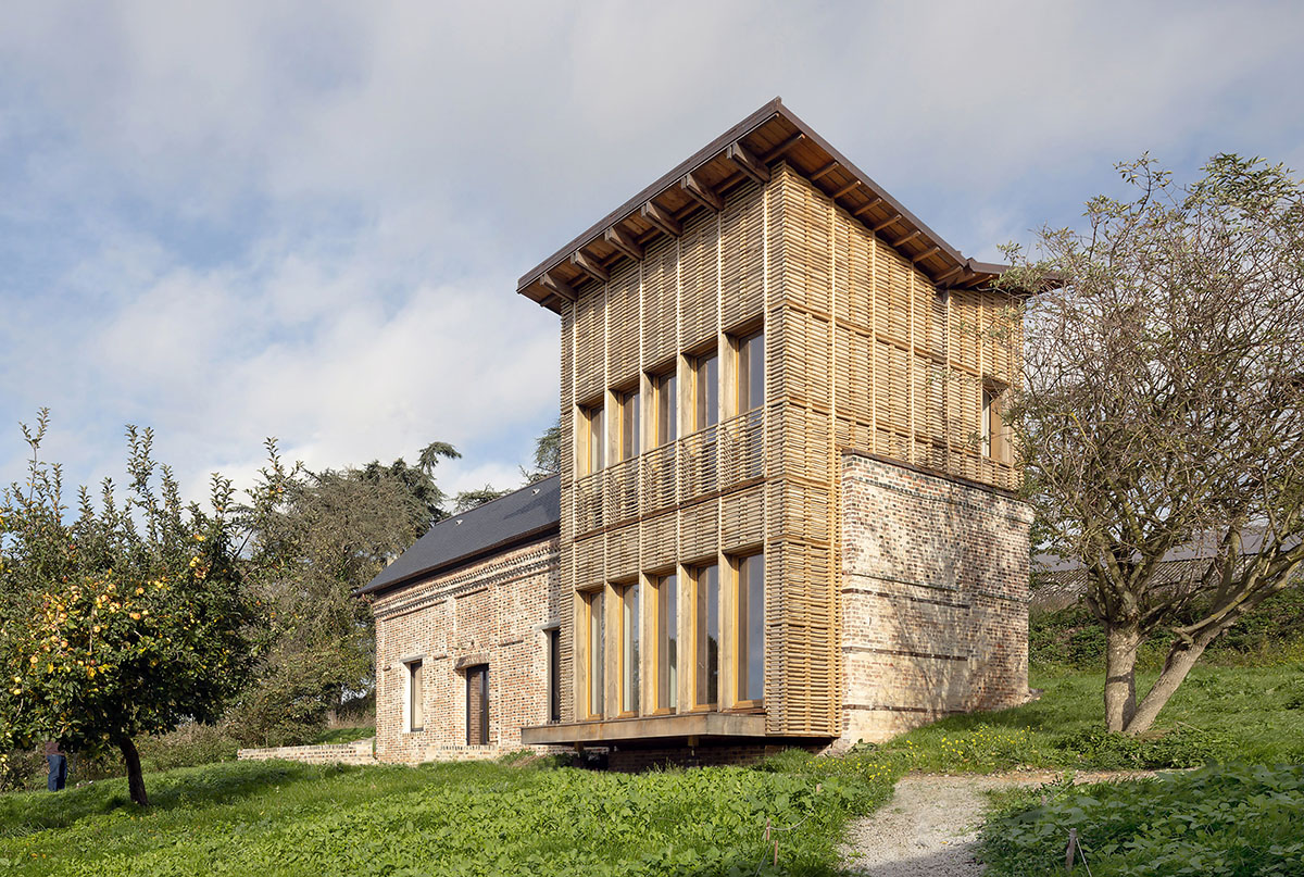 Rural house is renovated with 100 per cent local materials by Anatomies d’Architecture in Normandy