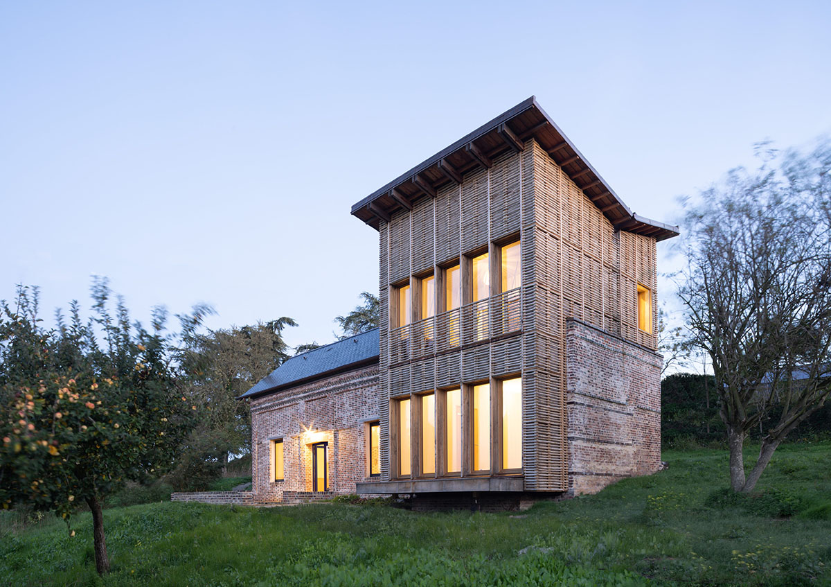 Rural house is renovated with 100 per cent local materials by Anatomies d’Architecture in Normandy