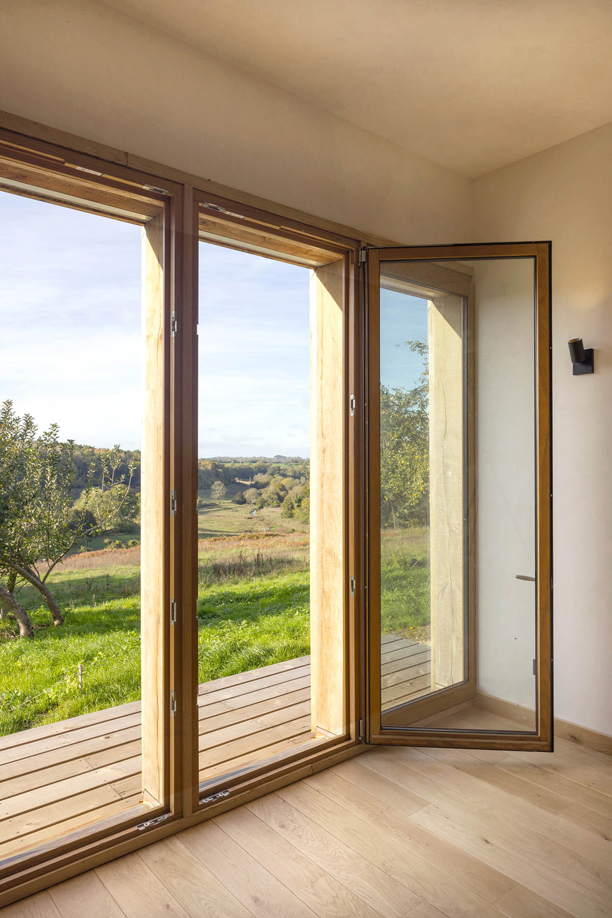 Rural house is renovated with 100 per cent local materials by Anatomies d’Architecture in Normandy