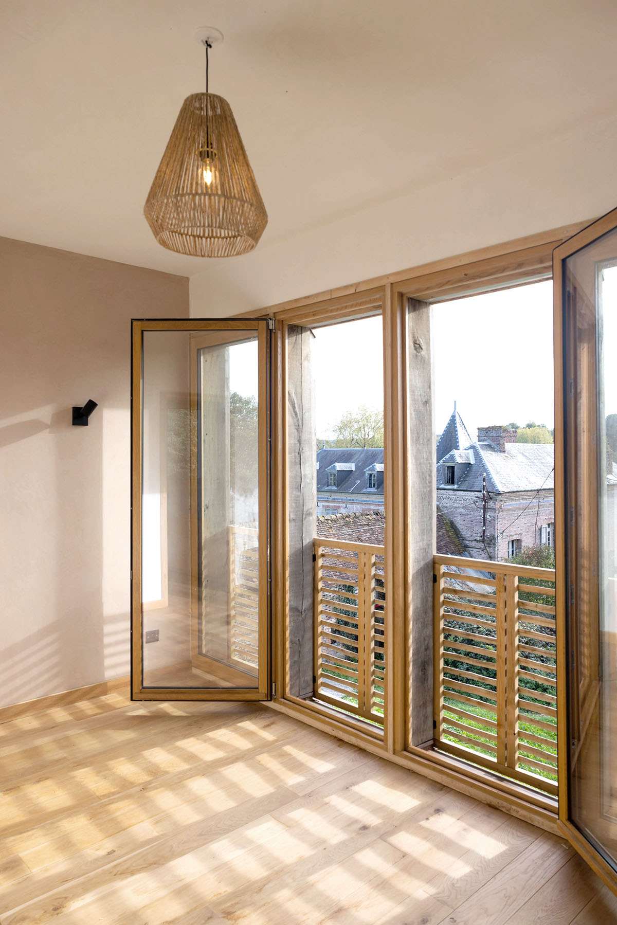 Rural house is renovated with 100 per cent local materials by Anatomies d’Architecture in Normandy