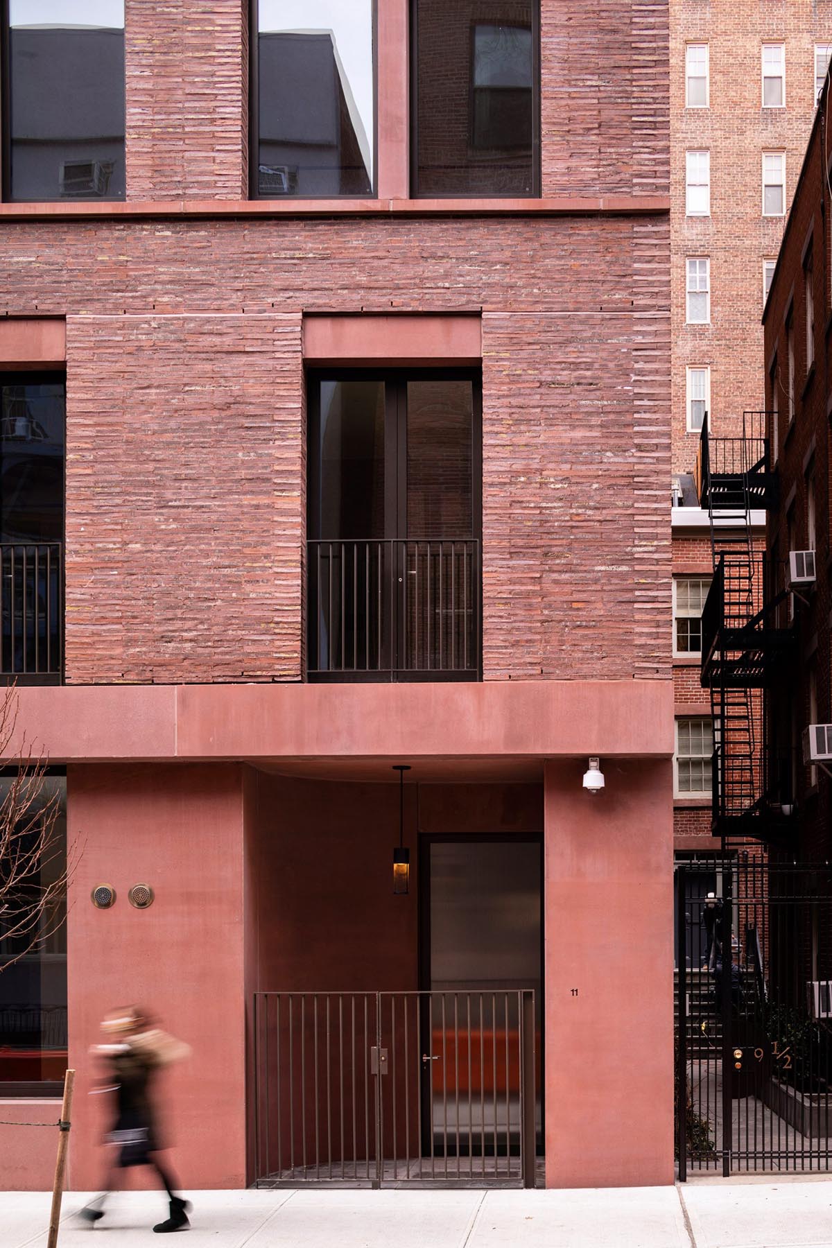 David Chipperfield Architects completes red pigmented apartment block in New York