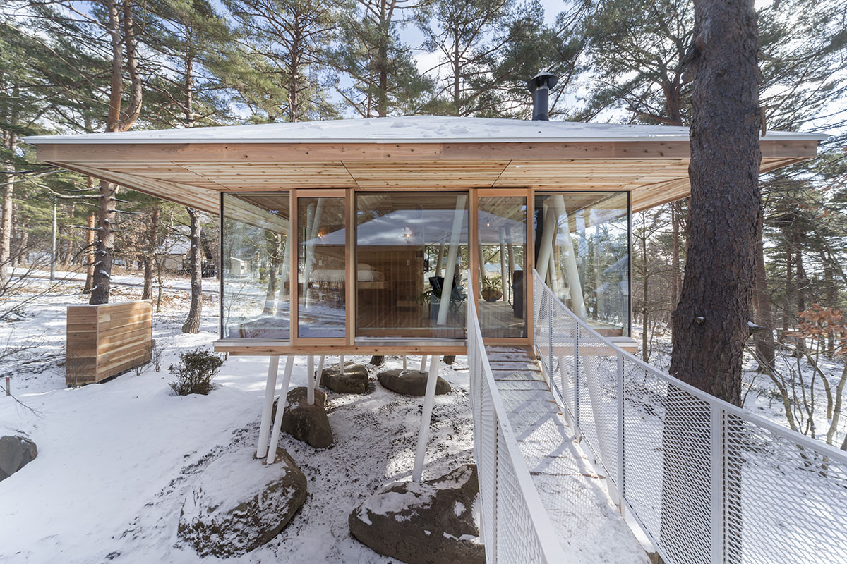 Life Style Koubou creates slender stilts to protect this family house from Bandai-san's snowfalls