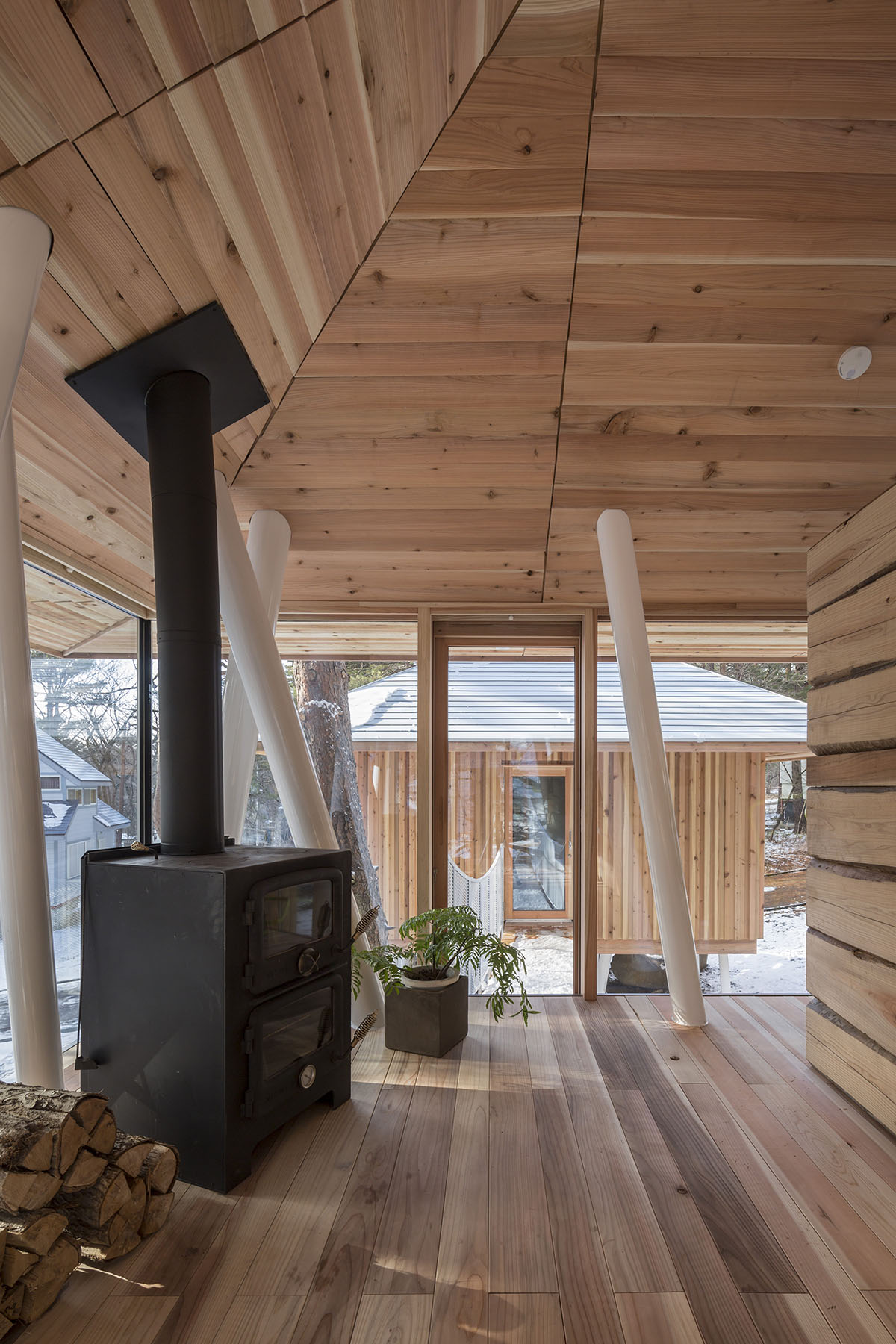 Life Style Koubou creates slender stilts to protect this family house from Bandai-san's snowfalls