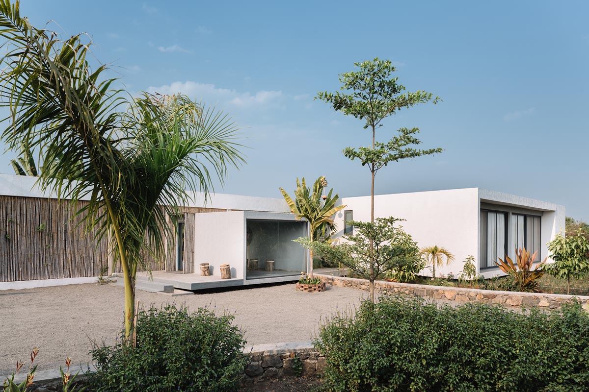 Weekend home is clad in bamboo screens that create a rustic appearance on the outskirts of Pune