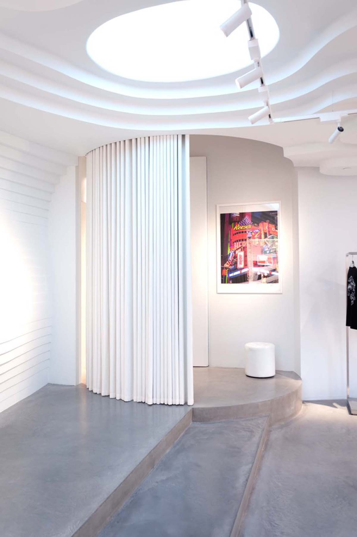 123 architects creates white cave retail and gallery space in Beijing