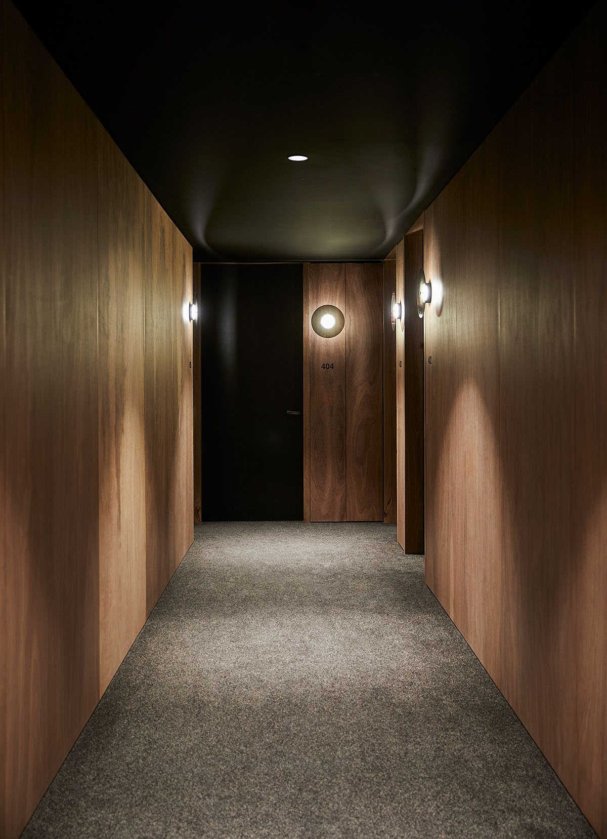 Wood Marsh's Alumuna Residences feature bronze folded mirrored glass in Australia