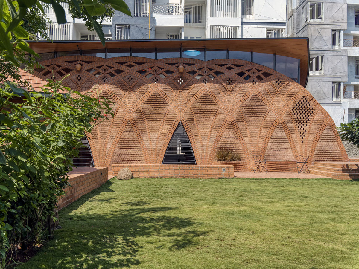 PMA madhushala's community center features undulating and artistic brick walls in Pune