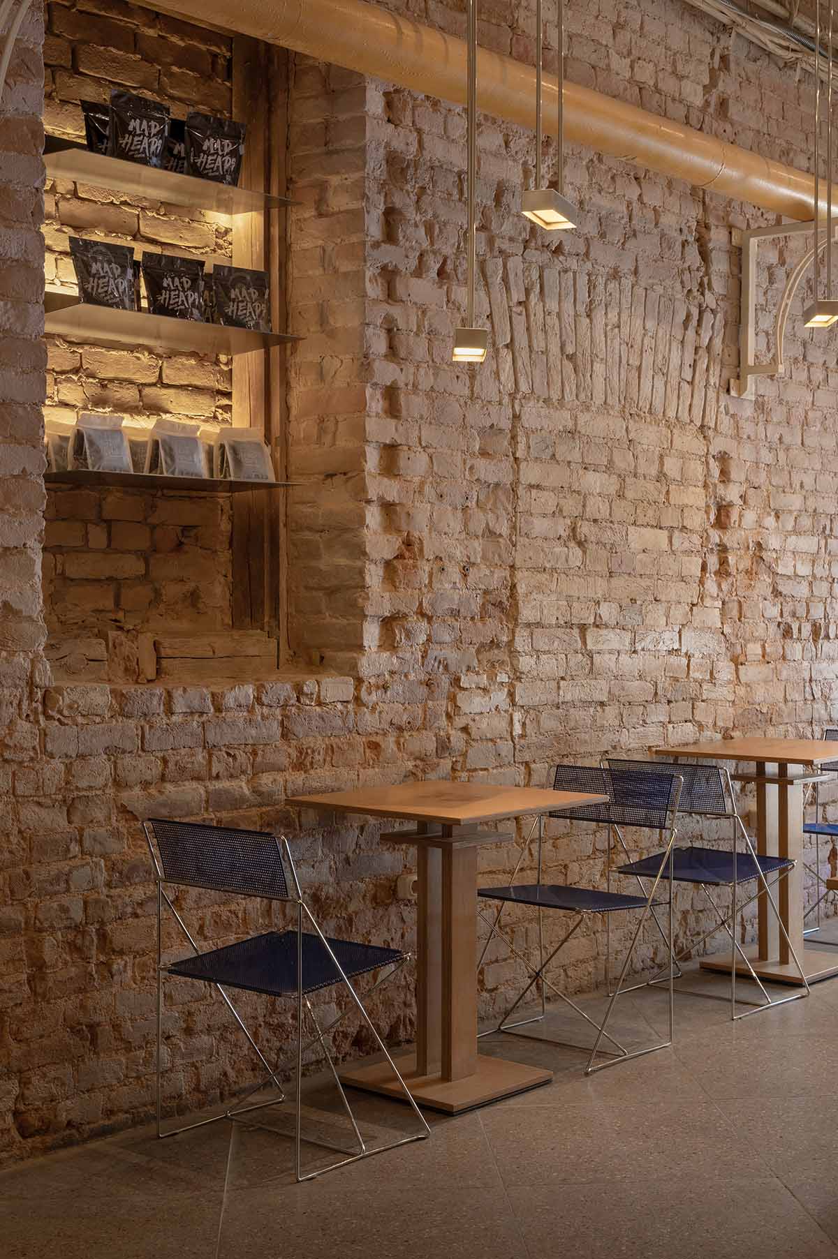 Nastia Mirzoyan completes restaurant and bar with sand-coloured bricks and stainless steel in Kyiv 