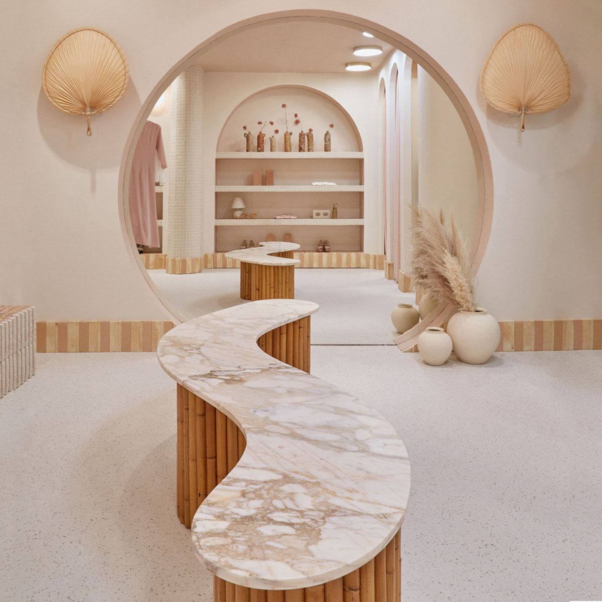 Patricia Bustos Studio creates light pink interiors with arched details for  concept store in Madrid