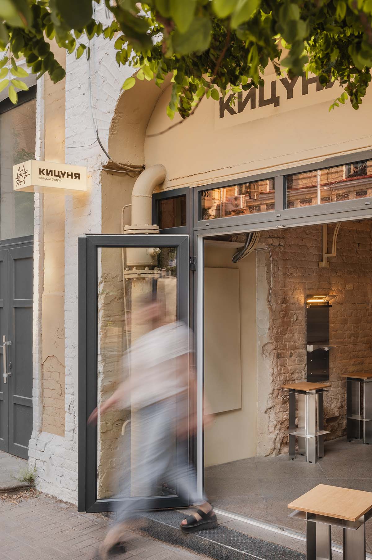 Nastia Mirzoyan completes restaurant and bar with sand-coloured bricks and stainless steel in Kyiv 