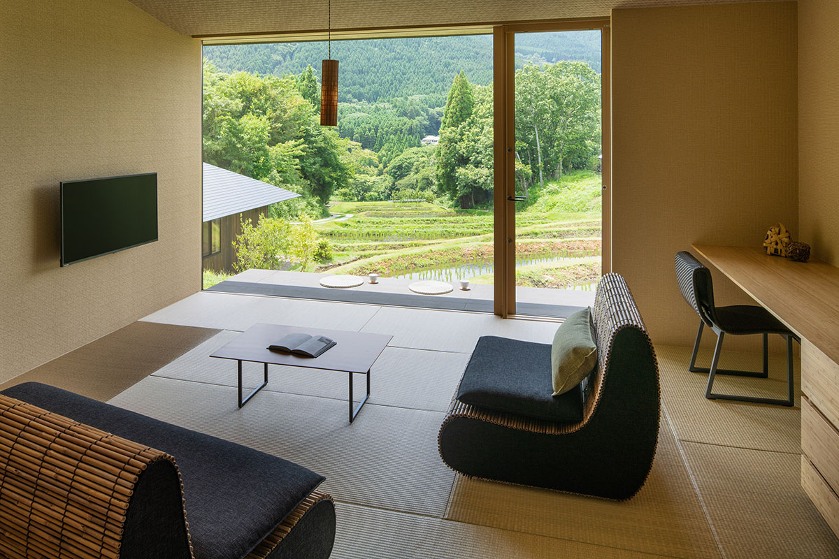 Kengo Kuma & Associates completes hot spring resort surrounded by cascading rice terraces in Kyushu