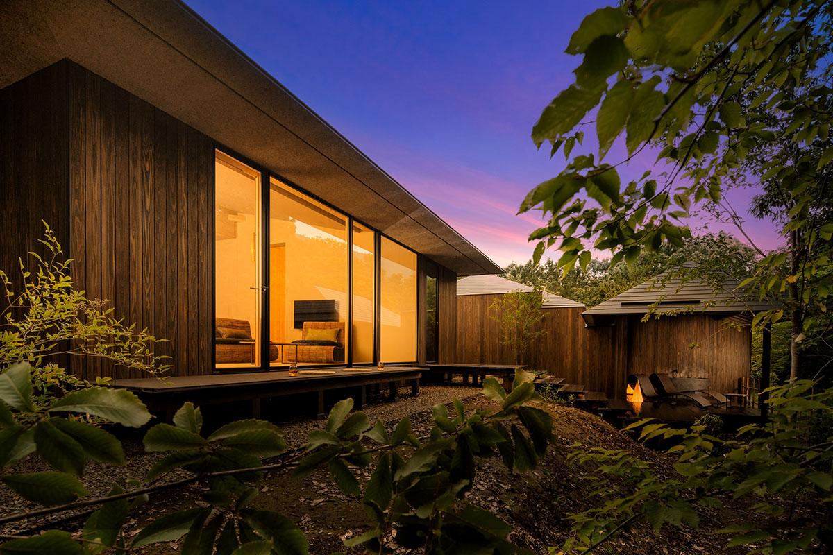 Kengo Kuma & Associates completes hot spring resort surrounded by cascading rice terraces in Kyushu