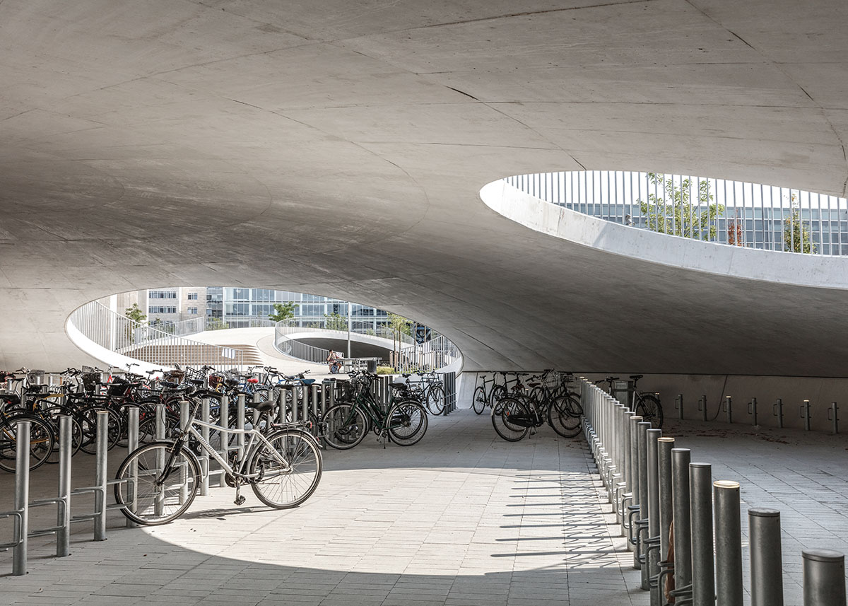 COBE creates undulating landscape with hollow hills for cyclists