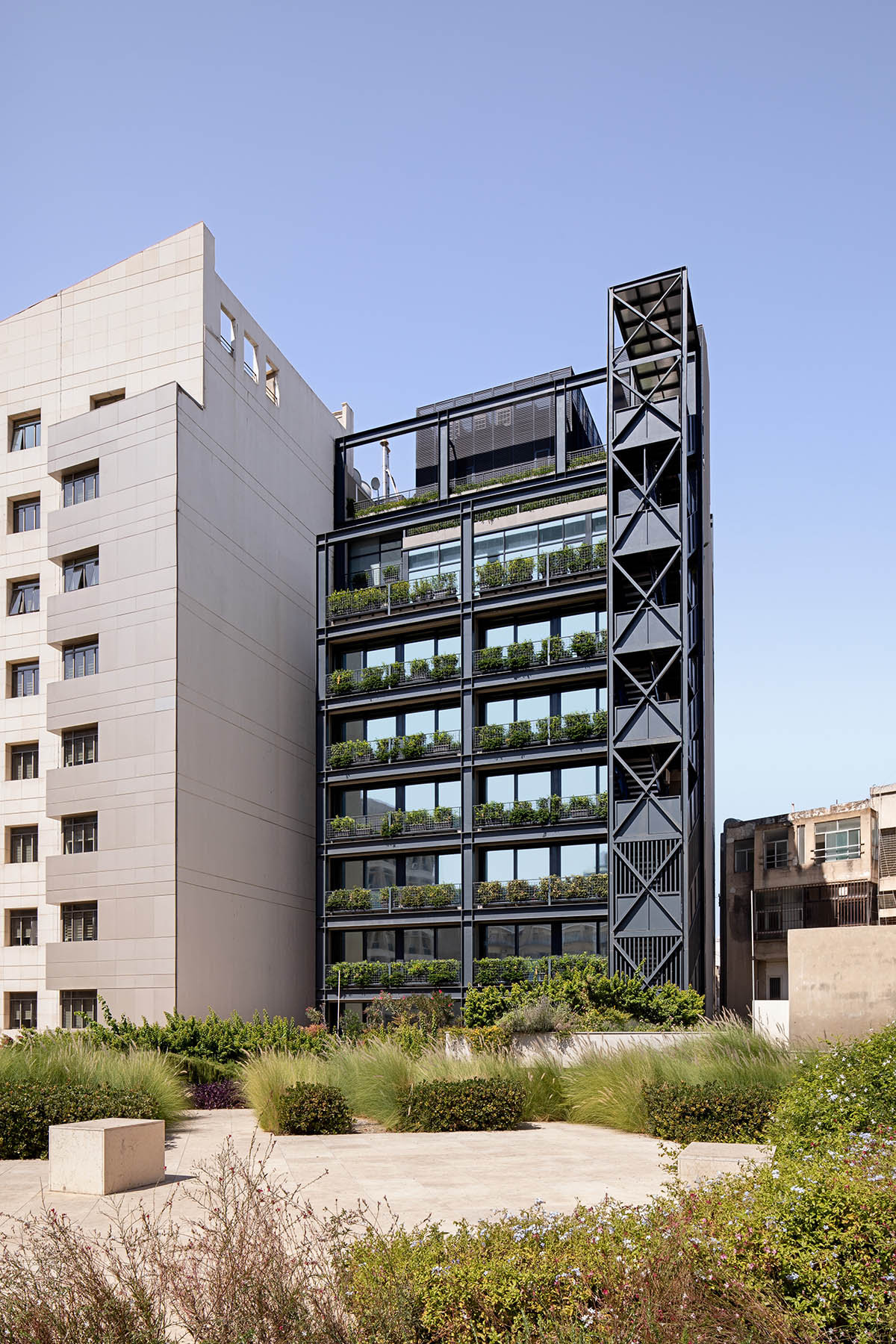 Karim Nader's tower with black steel exoskeleton consolidates Beirut's historical buildings