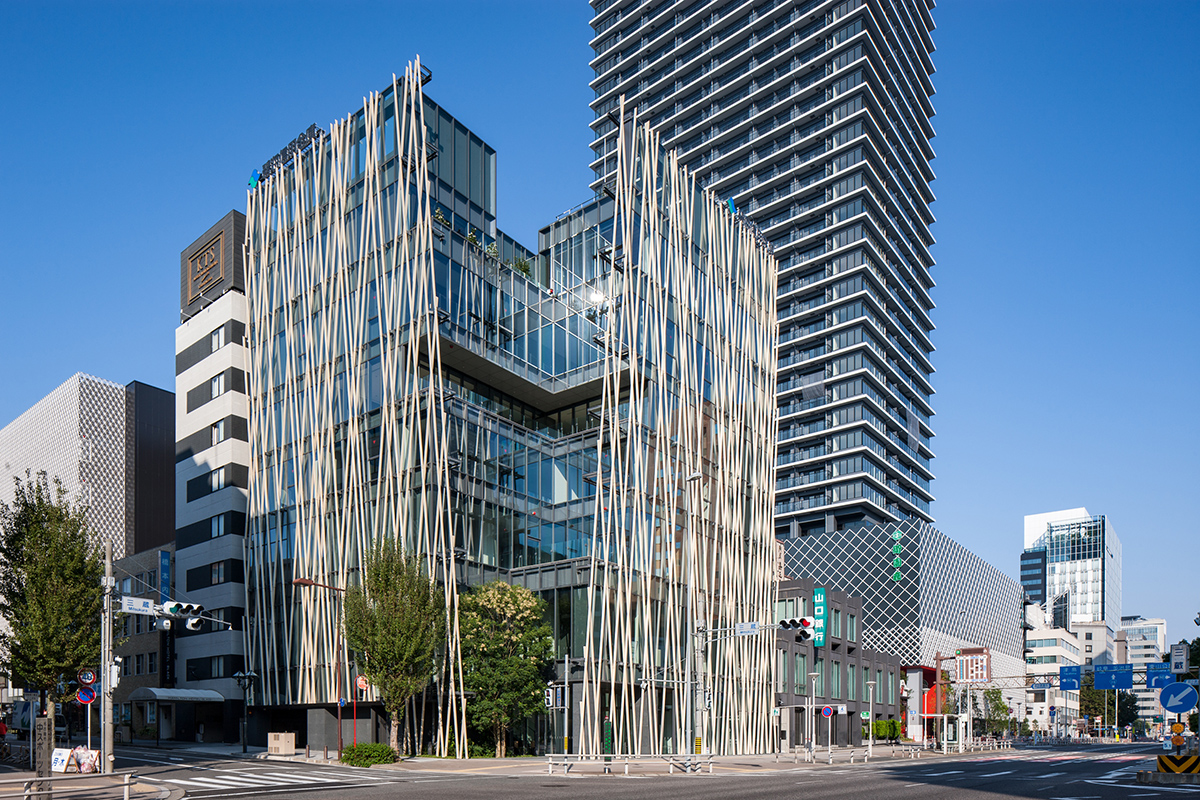 Kengo Kuma wraps office building with wooden lattice in Japan