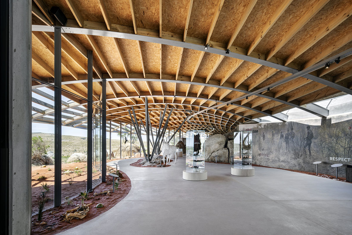 KLG Architects completes heritage center with undulating roof that acts as a small shelter