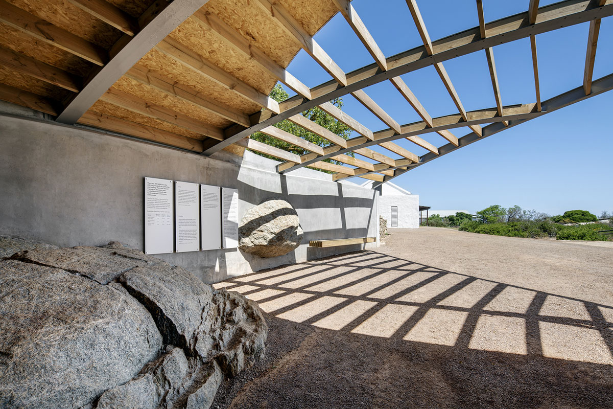 KLG Architects completes heritage center with undulating roof that acts as a small shelter