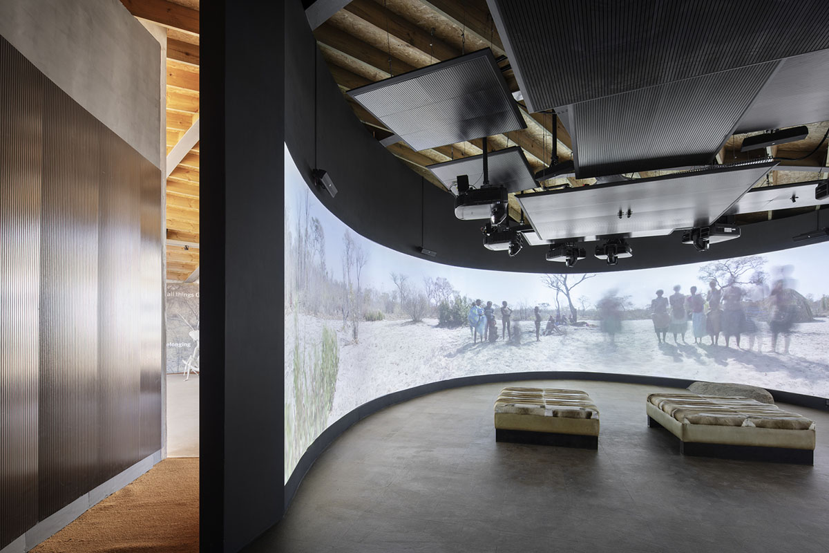 KLG Architects completes heritage center with undulating roof that acts as a small shelter