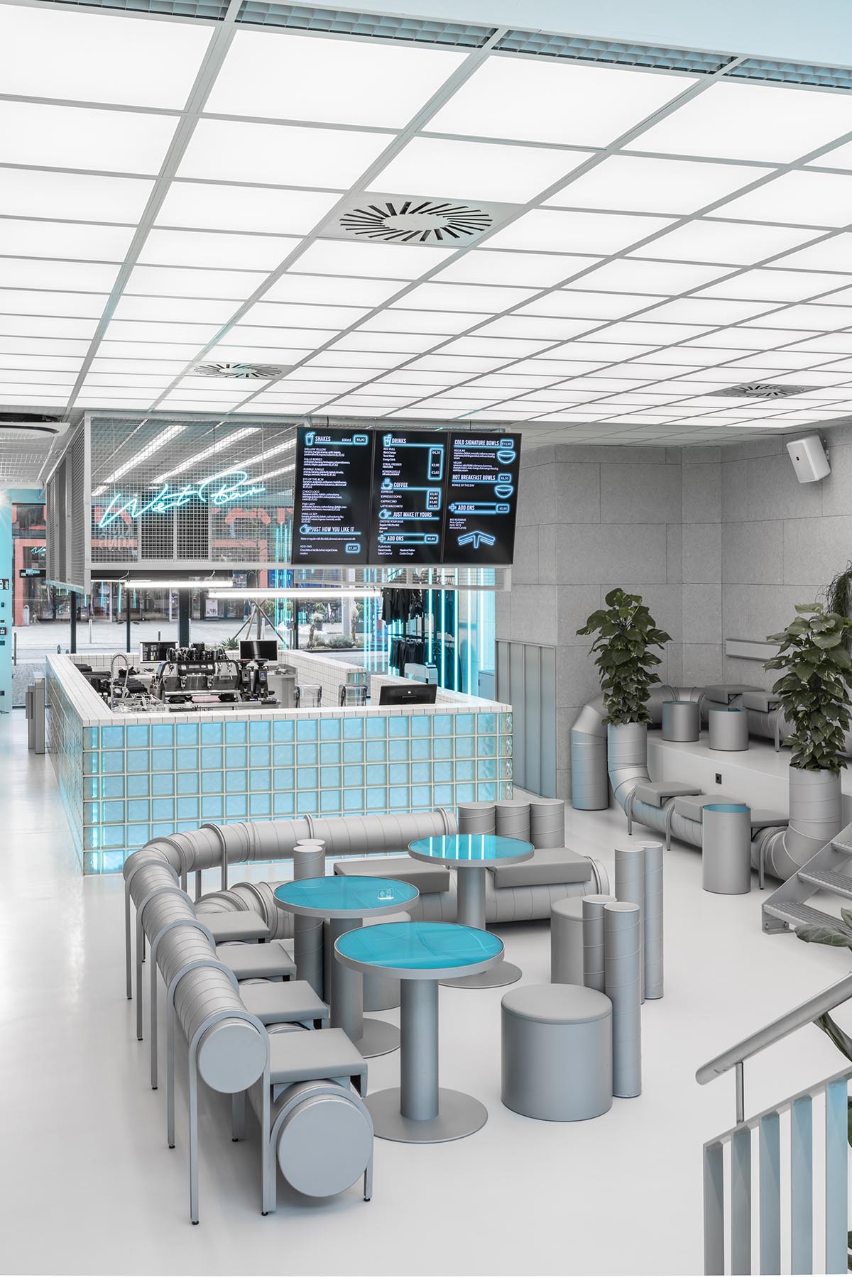Masquespacio's gym interiors explore 1980s techno style and cyberpunk with neon colors in Austria 