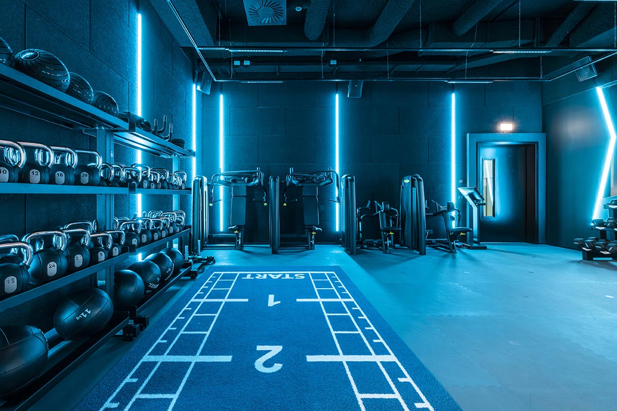 Masquespacio's gym interiors explore 1980s techno style and cyberpunk with neon colors in Austria 