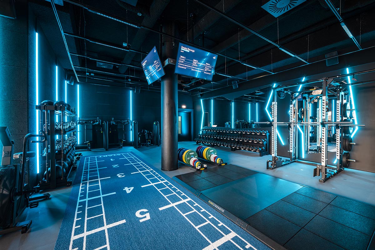 Masquespacio's gym interiors explore 1980s techno style and cyberpunk with neon colors in Austria 