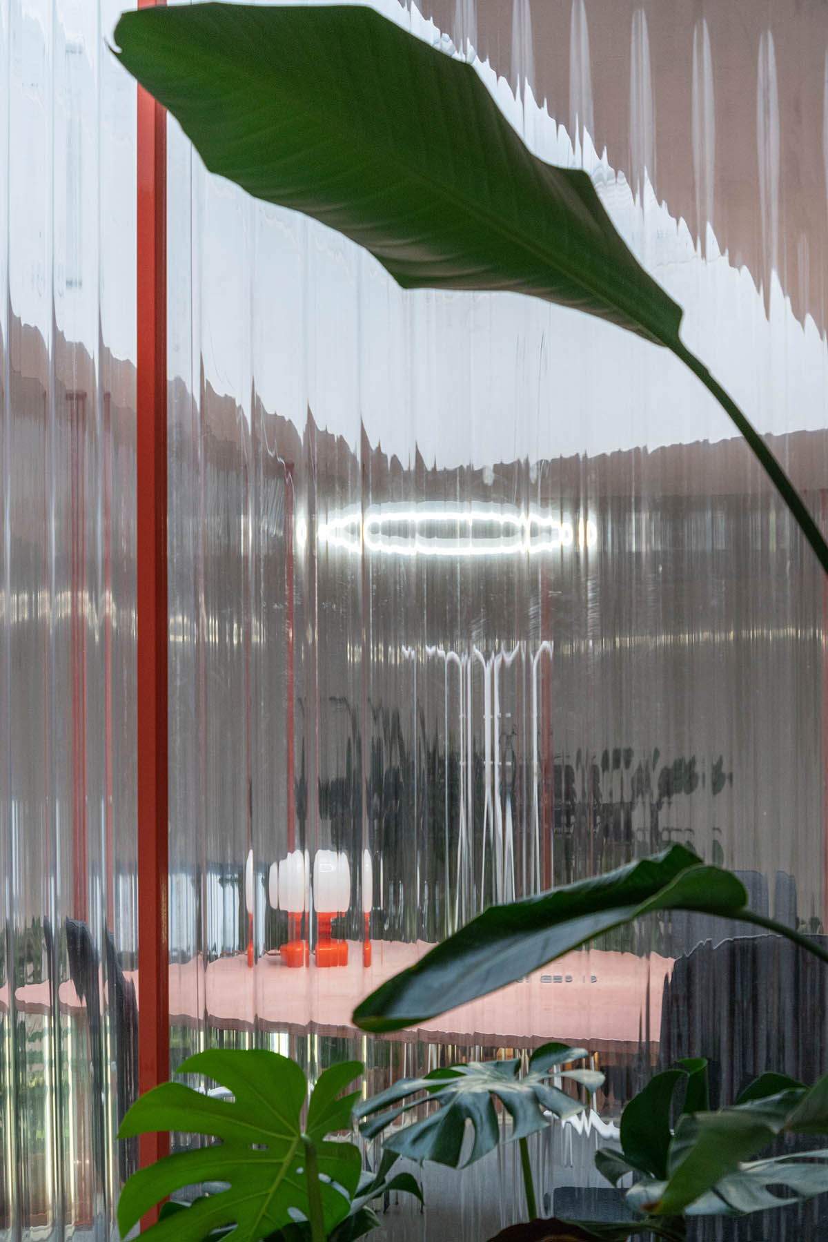 KOGAA crowns Prague's industrial coffee hub with additional working space filled with loop of plants