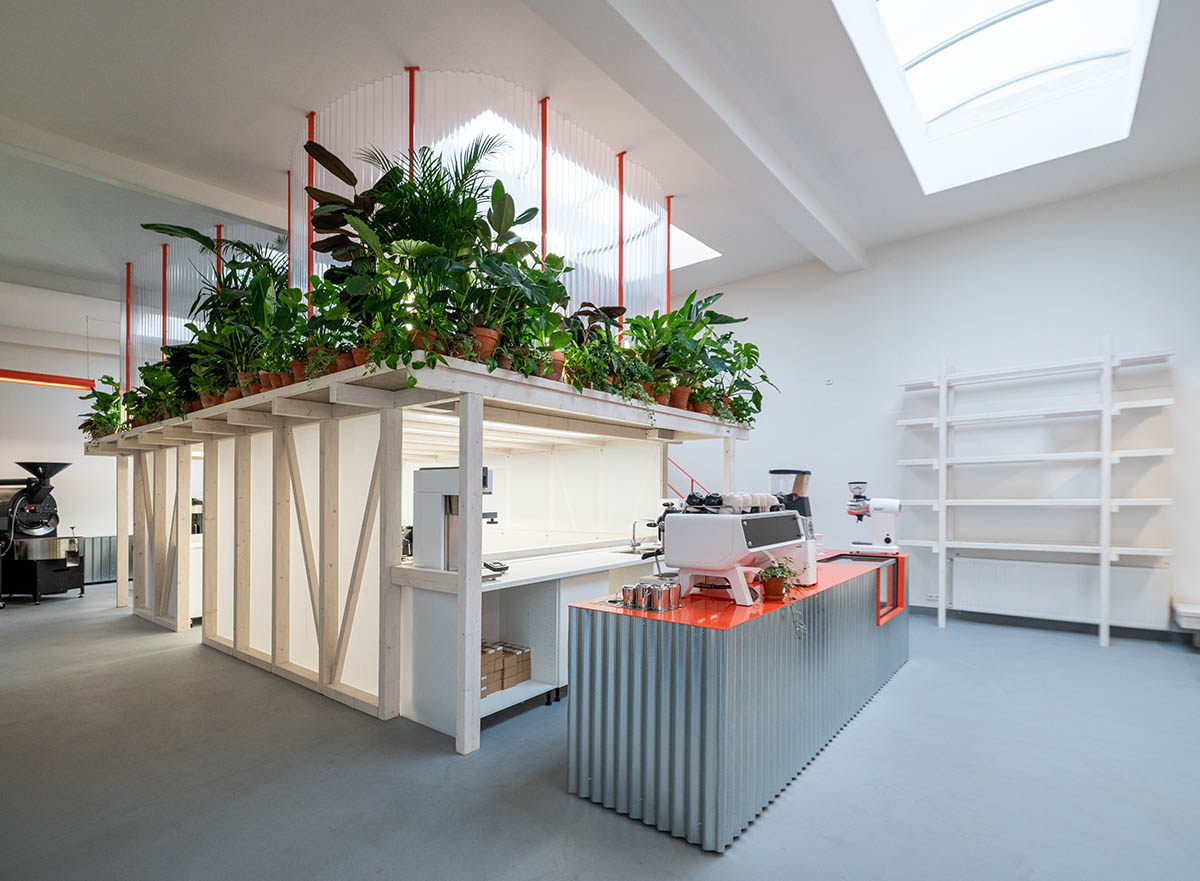 KOGAA crowns Prague's industrial coffee hub with additional working space filled with loop of plants