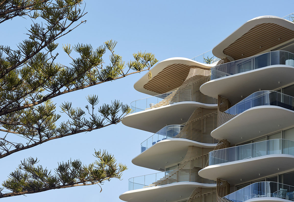 Residential building in Australia features sculptural and wavy façade inspired by Norfolk pines 
