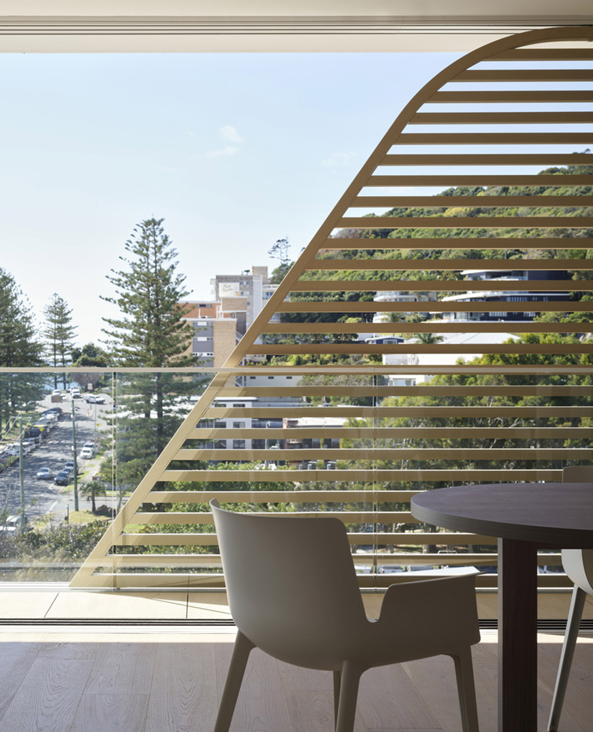 Residential building in Australia features sculptural and wavy façade inspired by Norfolk pines 