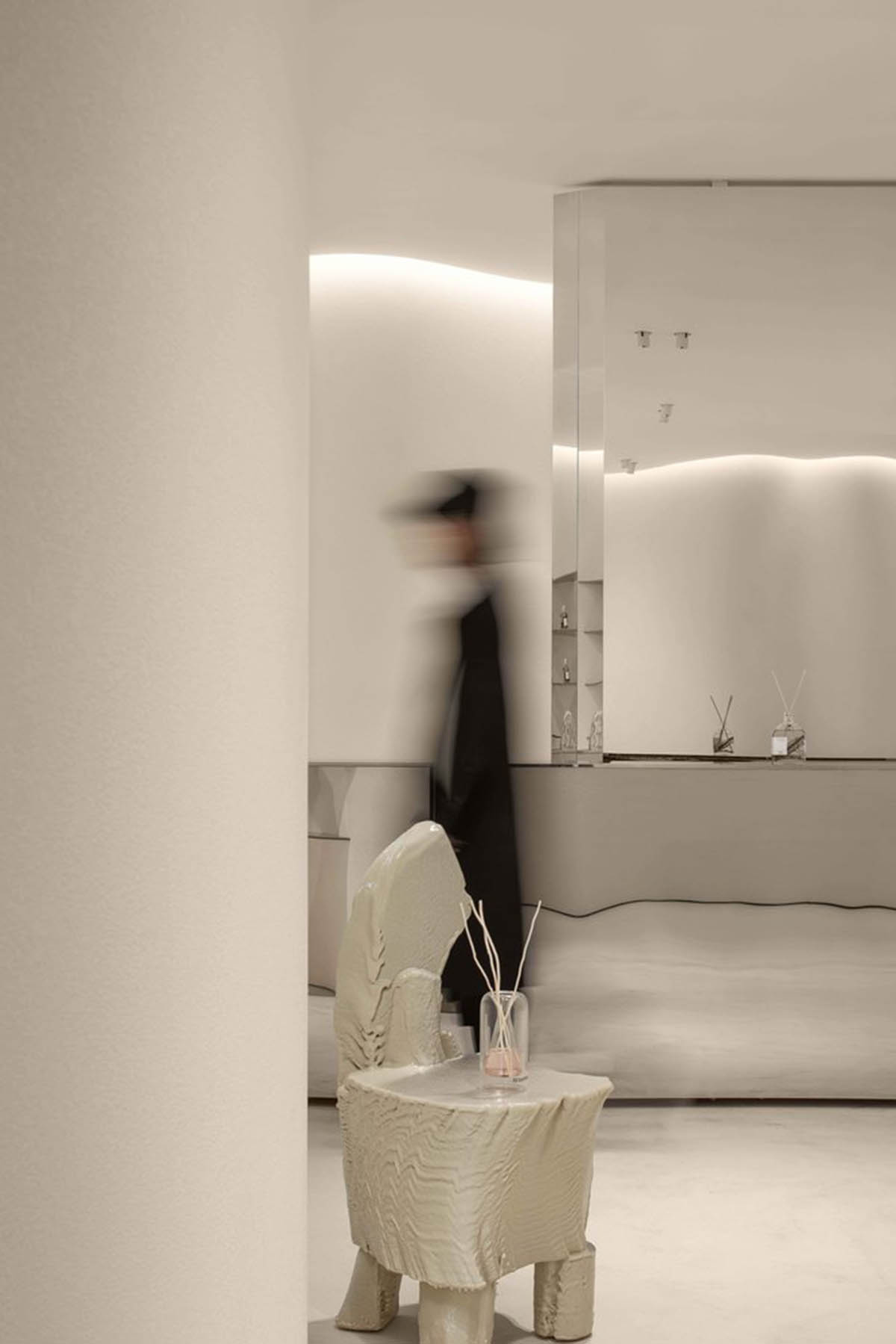 F.O.G. Architecture creates cave-like interiors with mirrored surfaces for aromatherapy store