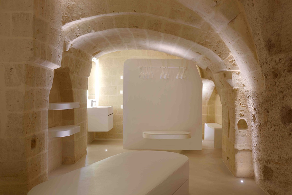Interiors of this cave hotel and spa by Simone Micheli act like work of art with excavated surfaces