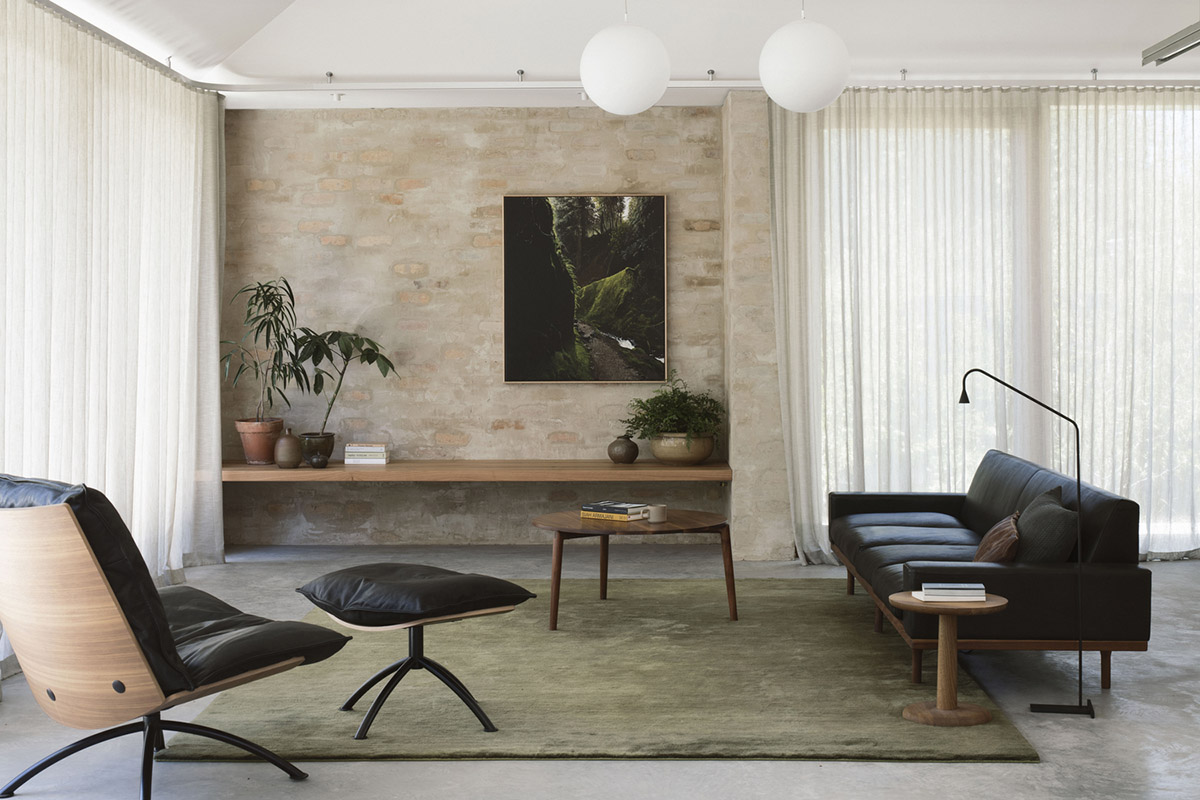 Textured brick walls reflects light, colour and textures of Autumn in Kyneton House by Edition Office