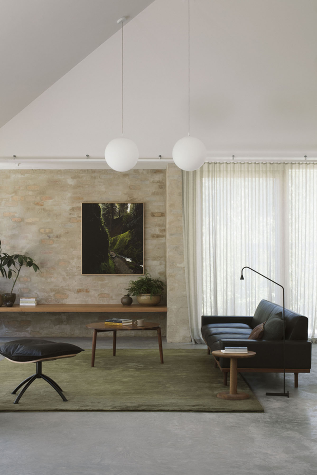 Textured brick walls reflects light, colour and textures of Autumn in Kyneton House by Edition Office