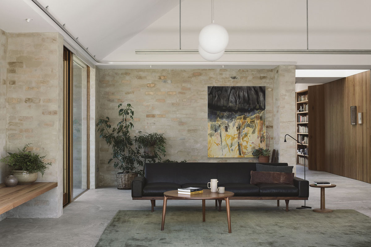 Textured brick walls reflects light, colour and textures of Autumn in Kyneton House by Edition Office