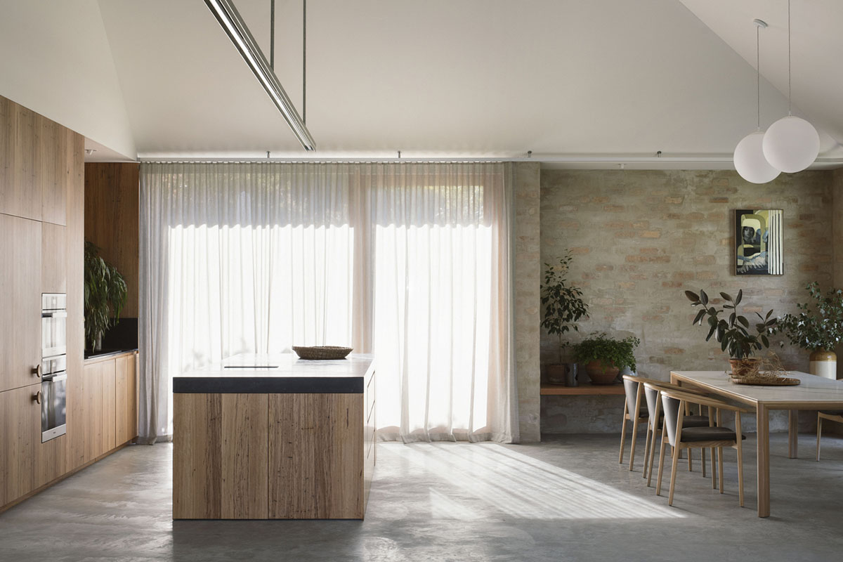 Textured brick walls reflects light, colour and textures of Autumn in Kyneton House by Edition Office
