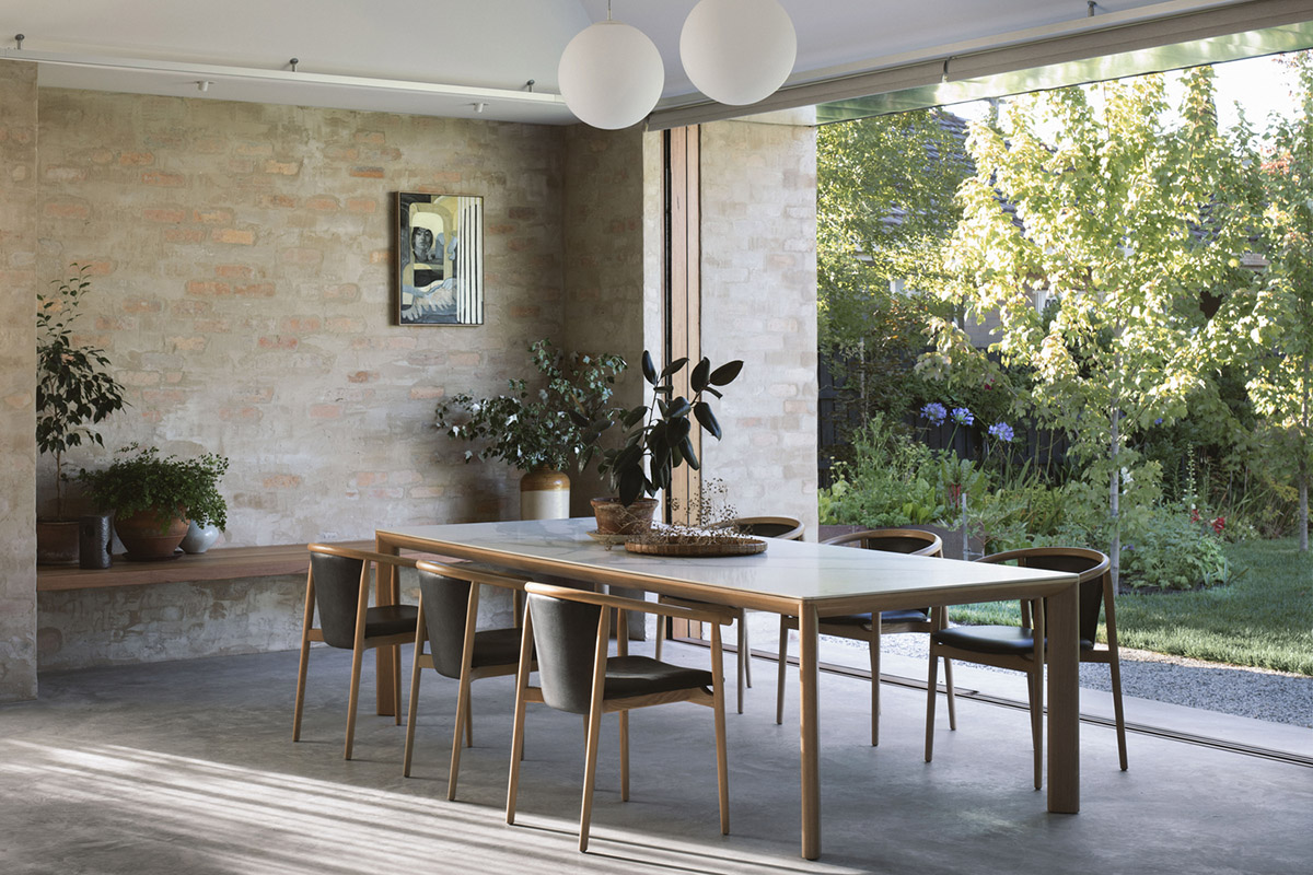 Textured brick walls reflects light, colour and textures of Autumn in Kyneton House by Edition Office