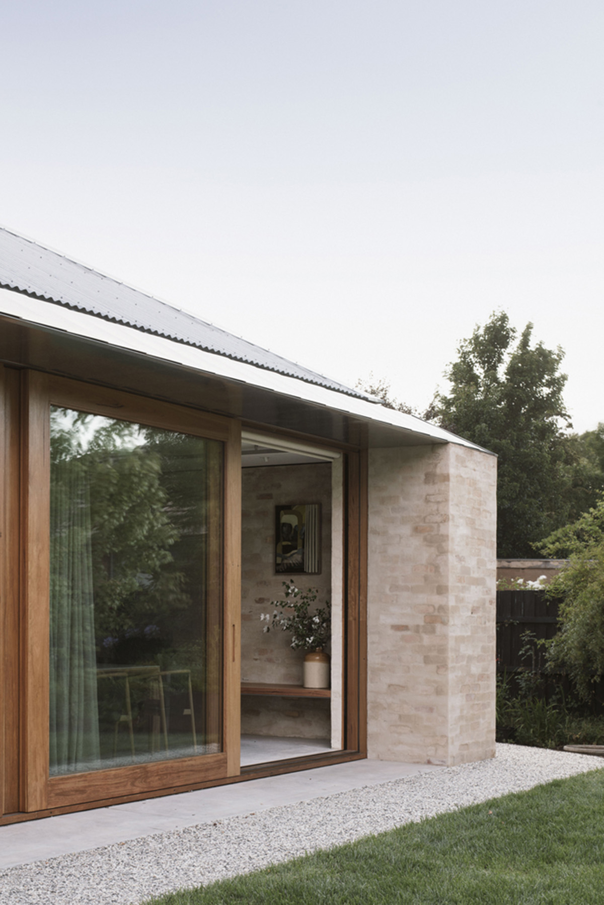 Textured brick walls reflects light, colour and textures of Autumn in Kyneton House by Edition Office