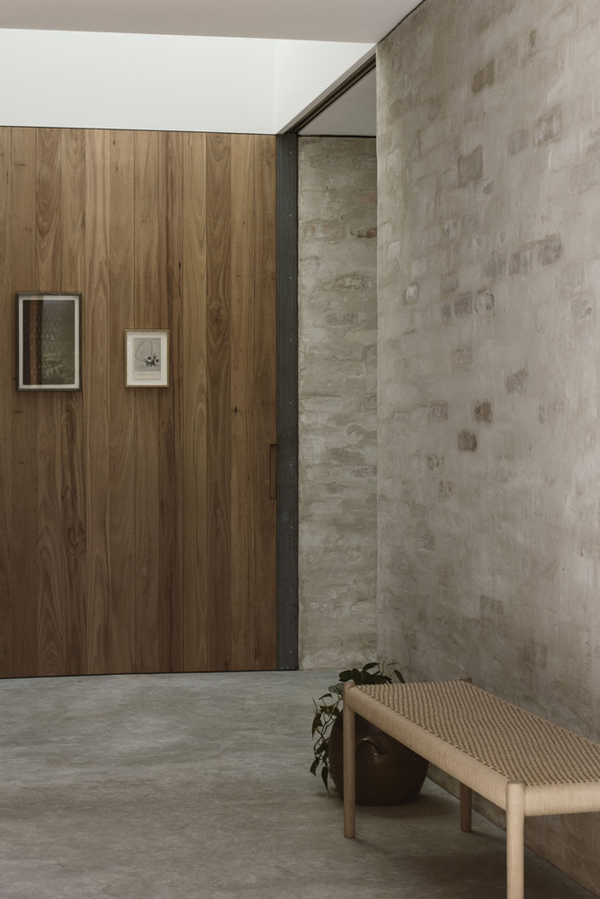 Textured brick walls reflects light, colour and textures of Autumn in Kyneton House by Edition Office