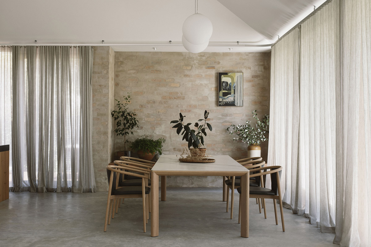 Textured brick walls reflects light, colour and textures of Autumn in Kyneton House by Edition Office