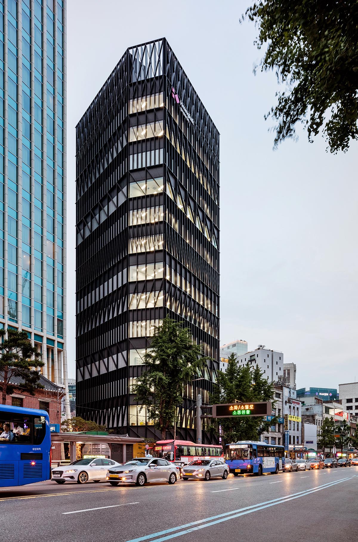Mecanoo completes its first Seoul office tower with black linear patterns