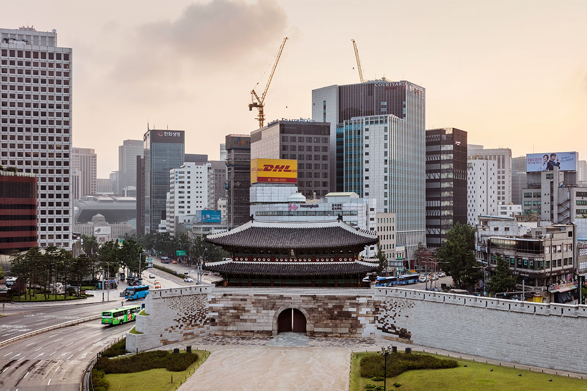 Mecanoo completes its first Seoul office tower with black linear patterns