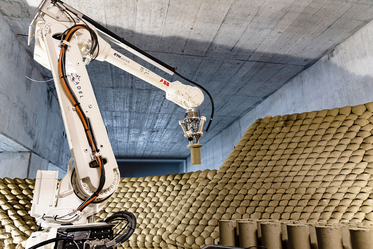Gramazio Kohler Research used 30,000 soft clay bricks to install undulating clay rotunda in Bern