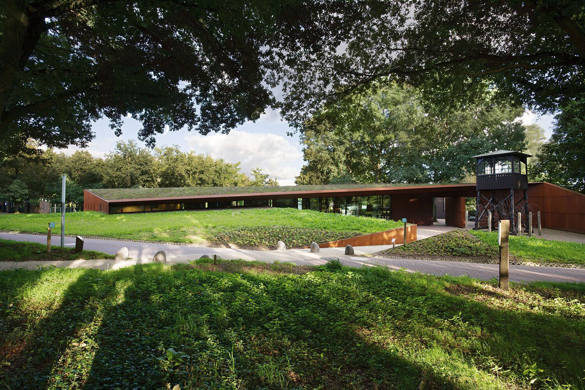 Inbo BV redesigns historic prisoner camp site with reflective pavilion and underground museum