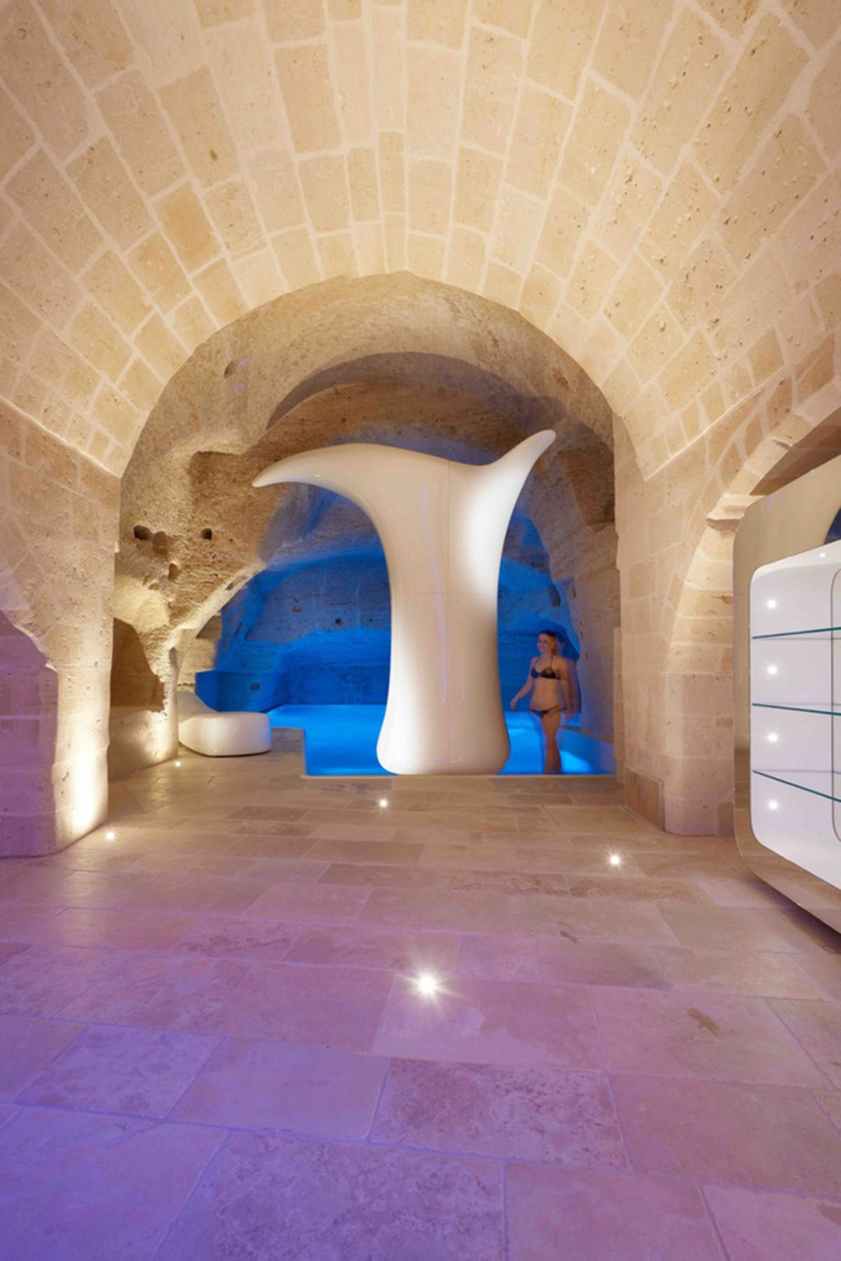 Interiors of this cave hotel and spa by Simone Micheli act like work of art with excavated surfaces