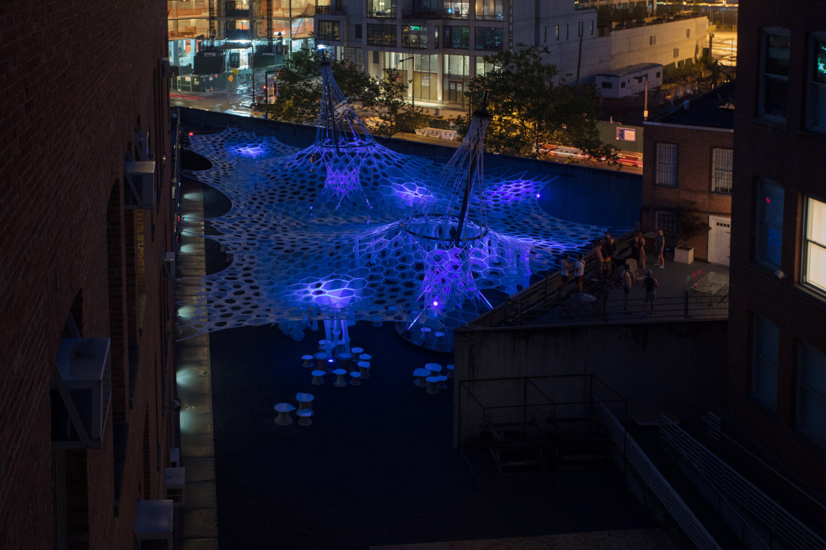 Jenny Sabin Studio&rsquo;s cellular Lumen fabric wraps MoMA PS1&rsquo;s courtyard in NY
